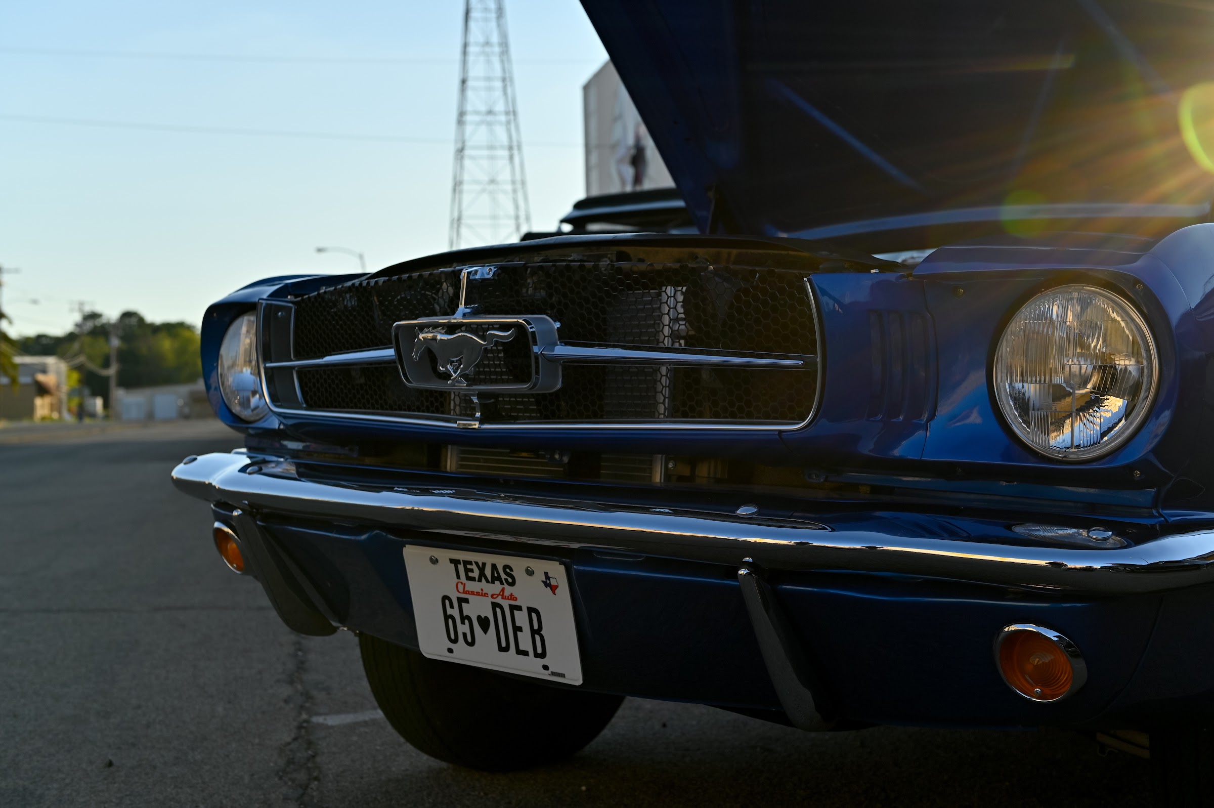 A classic blue car parked with its hood open in late afternoon sunlight — car photography in East Texas by Kaden Baker
